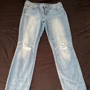 Old navy blue ripped jeans